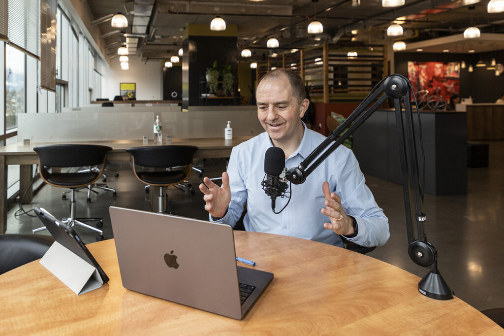 Rich Scott speaking to his audience in a virtual meeting.